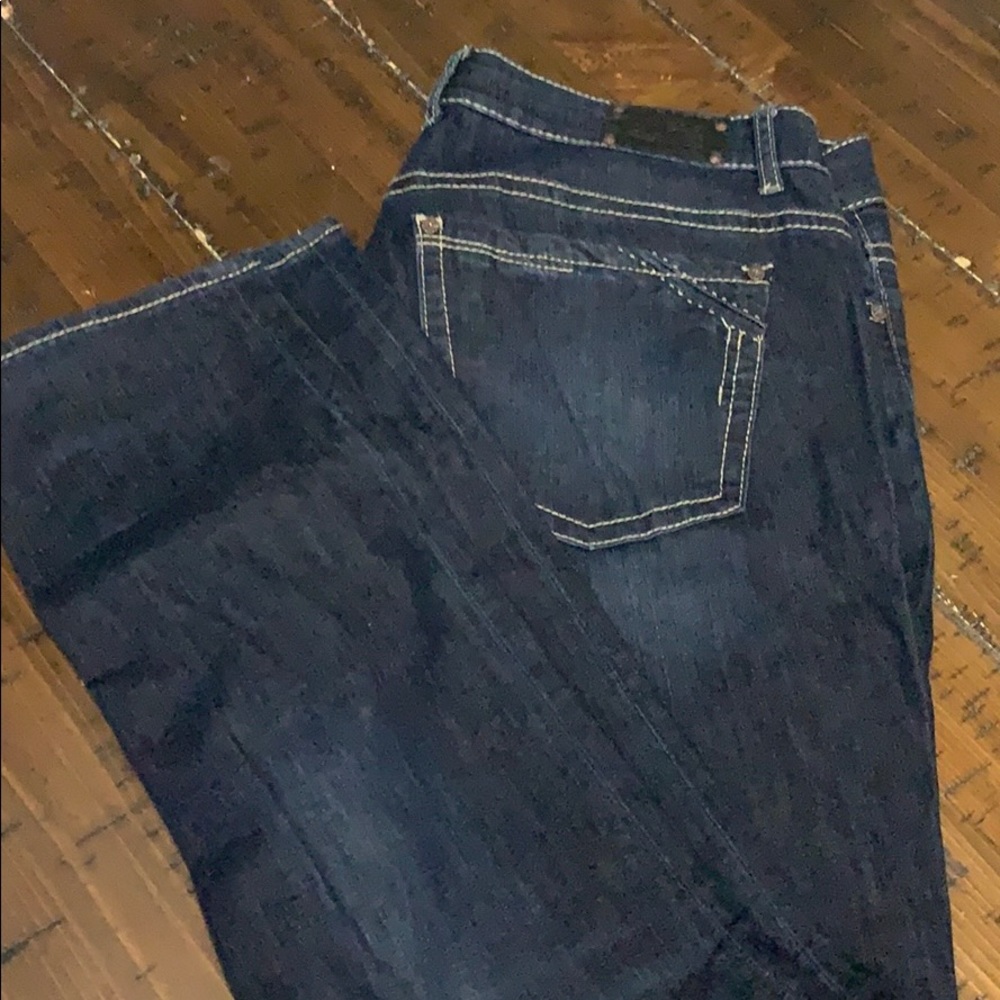 Buckle black skinny jeans